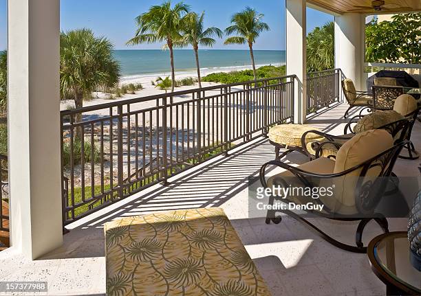 beach view from veranda of estate home in florida - beach house balcony stock pictures, royalty-free photos & images