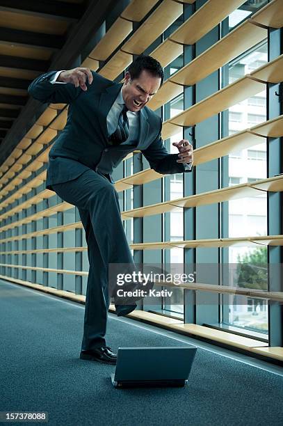 Man Breaking Computer Photos and Premium High Res Pictures - Getty Images