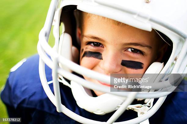 young football player - american football uniform stock pictures, royalty-free photos & images