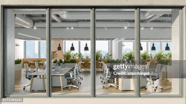 outside view of modern office space with office desks, chairs, and plants - wide stock pictures, royalty-free photos & images