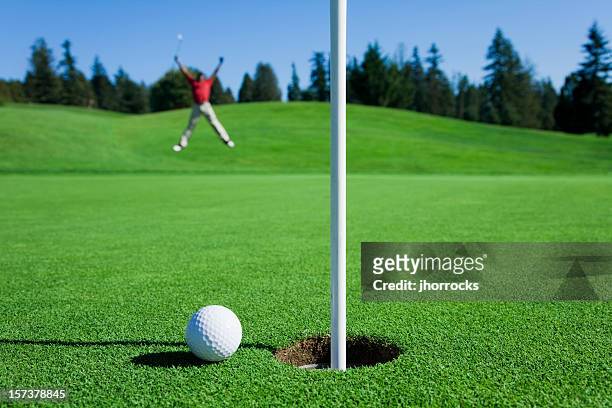 awesome chip shot - golf excitement stock pictures, royalty-free photos & images