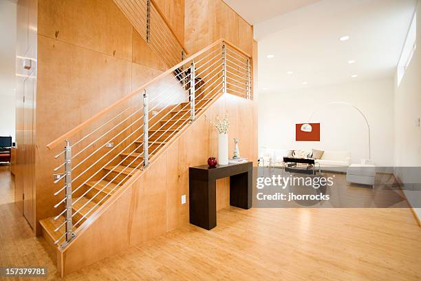 modern living space with natural light - wooden railing stock pictures, royalty-free photos & images