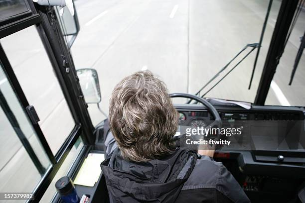 autista di autobus dall'alto - autista di autobus foto e immagini stock