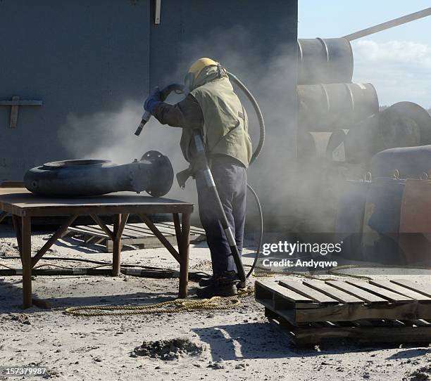 sand blasting pipe - sandblasting stockfoto's en -beelden