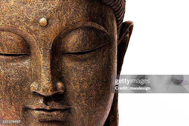 vorderansicht des buddha gesicht - buddhism stock-fotos und bilder