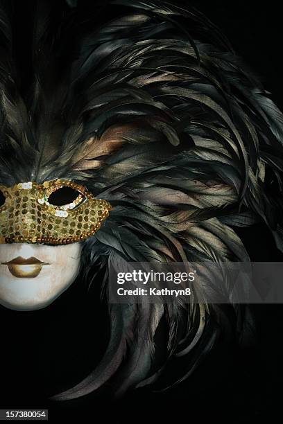 mask and feathers on black - maskeradmask bildbanksfoton och bilder