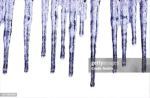 blue icicles isolated on white - ijspegel stockfoto's en -beelden