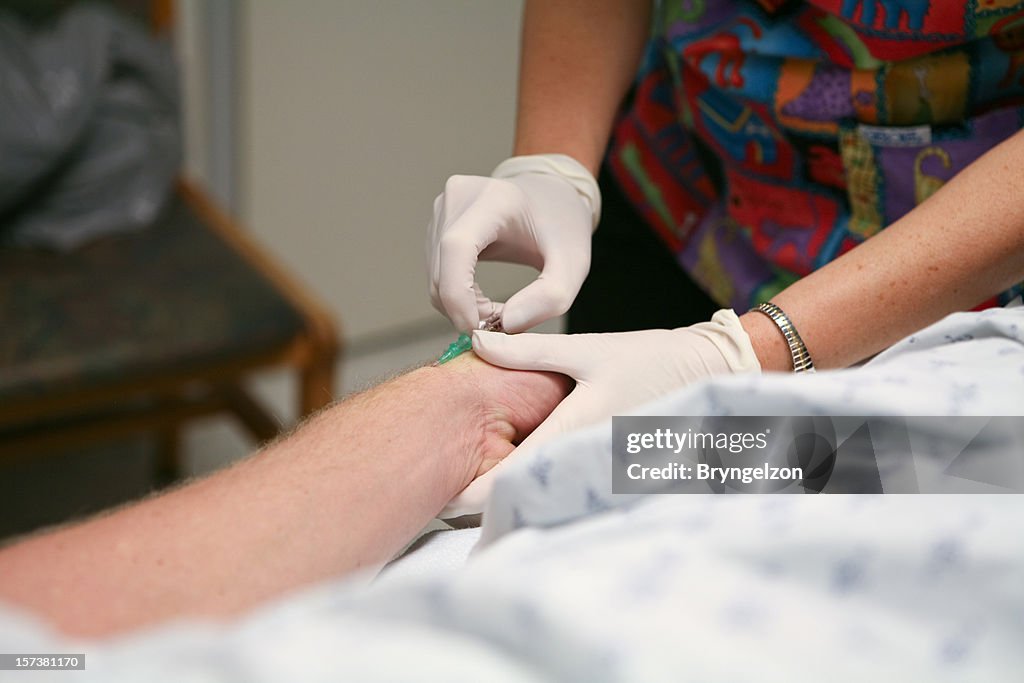 Inserting IV Needle