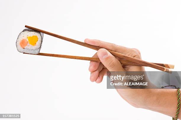 sushi roll and chopsticks - 箸 個照片及圖片檔