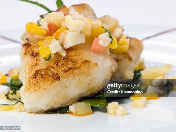 saute sea bass with mango-tropical fruits sauce - halibut stock pictures, royalty-free photos & images