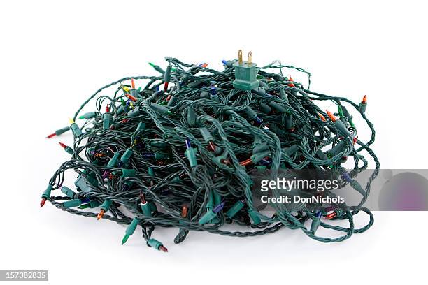 tangled christmas lights - tied up stock pictures, royalty-free photos & images
