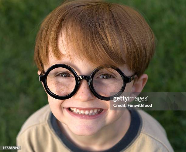 boy harry potter, child wearing black glasses, halloween costume & eyeglasses - harry potter glasses stock pictures, royalty-free photos & images