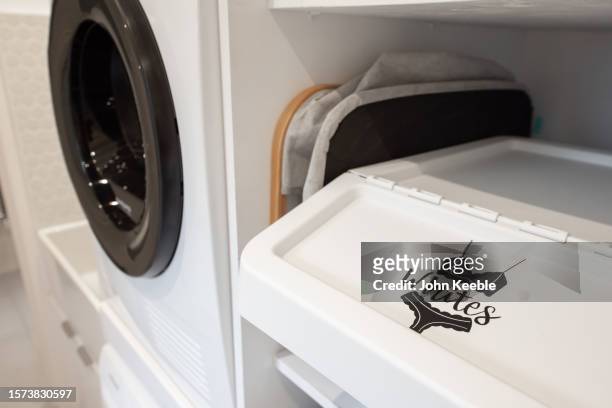 property interiors - washing basket stock pictures, royalty-free photos & images