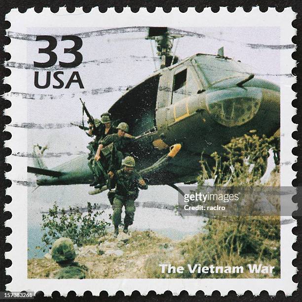 usa 33 cent postal stamp image of vietnam war - vietnam war photos stock pictures, royalty-free photos & images