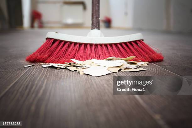 sweeping floor with broom - vegen stockfoto's en -beelden