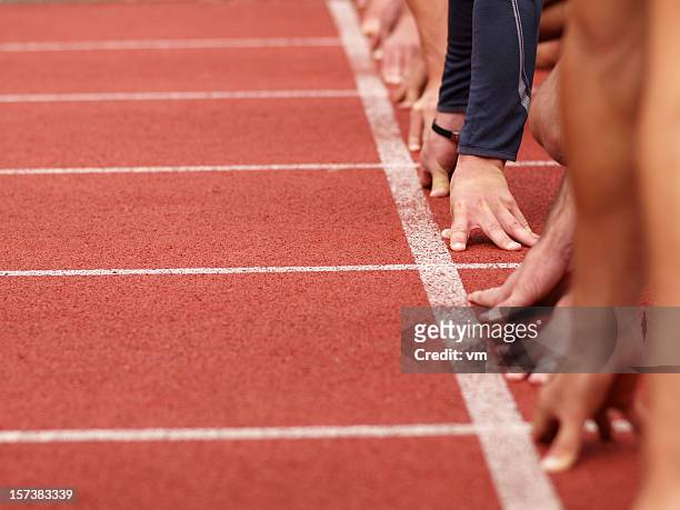 hands on starting line - starting block stock pictures, royalty-free photos & images