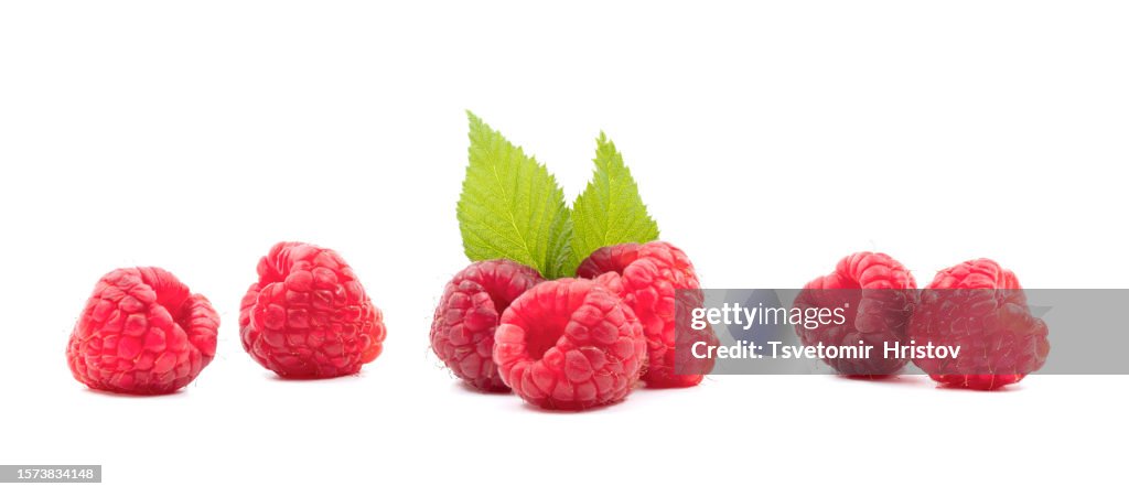 Ripe raspberries with leaf isolated on a white background, Set or collection