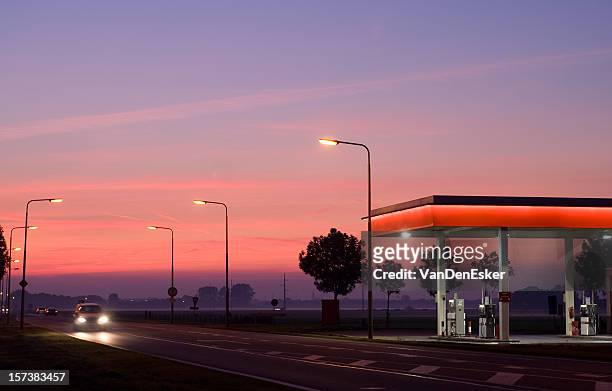 gasstation at night - 24 hours stock pictures, royalty-free photos & images