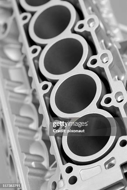 close-up of a engine block with 4 holes - car engine close up stock pictures, royalty-free photos & images