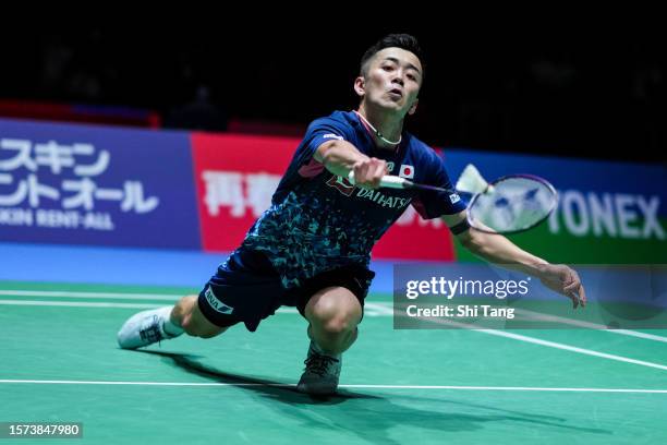 Kenta Nishimoto of Japan competes in the Men's Singles Second Round match against Kunlavut Vitidsarn of Thailand on day three of the Japan Open at...