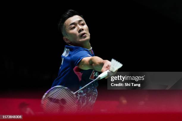 Kenta Nishimoto of Japan competes in the Men's Singles Second Round match against Kunlavut Vitidsarn of Thailand on day three of the Japan Open at...