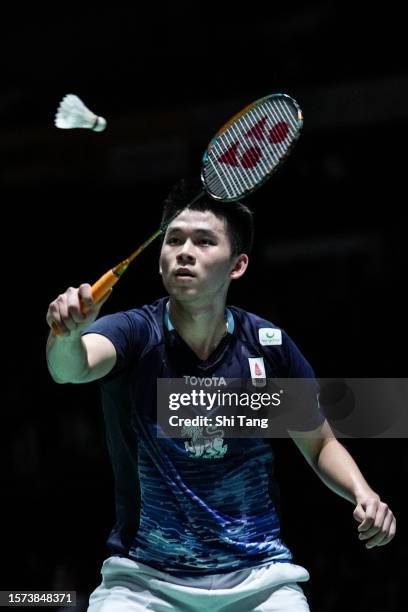 Kunlavut Vitidsarn of Thailand competes in the Men's Singles Second Round match against Kenta Nishimoto of Japan on day three of the Japan Open at...