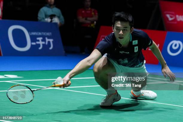 Kunlavut Vitidsarn of Thailand competes in the Men's Singles Second Round match against Kenta Nishimoto of Japan on day three of the Japan Open at...