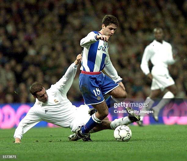 Ivan Helguera of Real Madrid and Victor of Deportivo La Coruna in action during the Primera Liga match between Real Madrid and Deportivo La Coruna,...