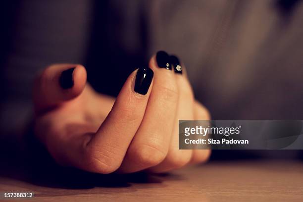 lost - black nail polish stock pictures, royalty-free photos & images