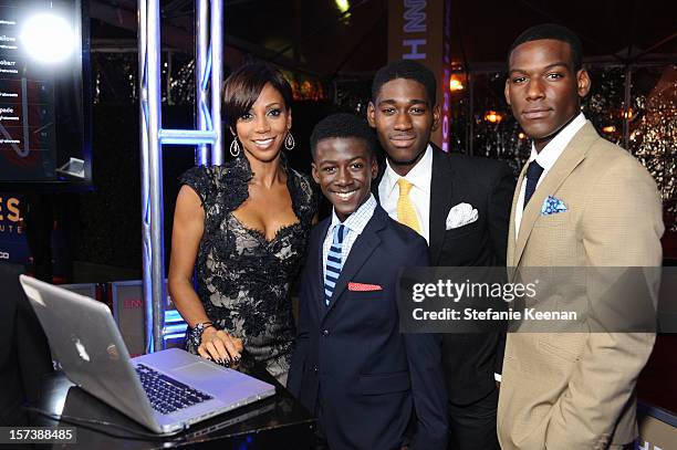 Actors Holly Robinson Peete, Kwesi Boakye, Kwame Boateng, and Kofi Siriboe attend the CNN Heroes: An All Star Tribute at The Shrine Auditorium on...