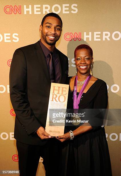 Athlete Cullen Jones and honoree Wanda Butts of The Josh Project attend the CNN Heroes: An All Star Tribute at The Shrine Auditorium on December 2,...