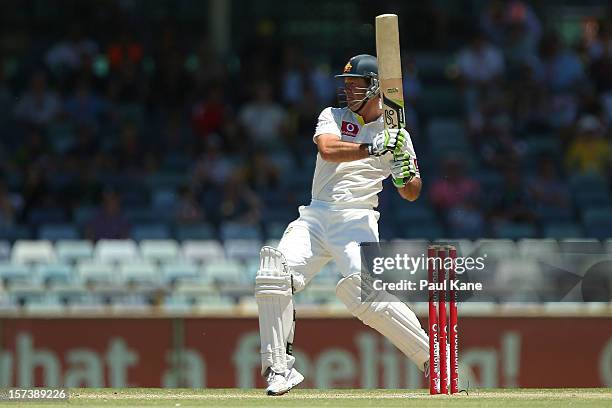 Ricky Ponting of Australia hits a boundary during day four of the Third Test Match between Australia and South Africa at WACA on December 3, 2012 in...