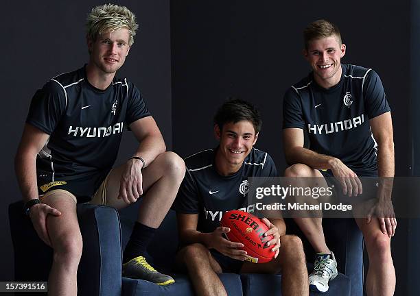 Draftees Nick Graham, Troy Menzel and Tom Temay pose for a photo during a Carlton Blues AFL media session at Visy Park on December 3, 2012 in...