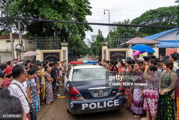 Police car enters the Insein Correctional Department in Yangon. The Myanmar military declared an amnesty for more than 7,500 detainees nationwide as...