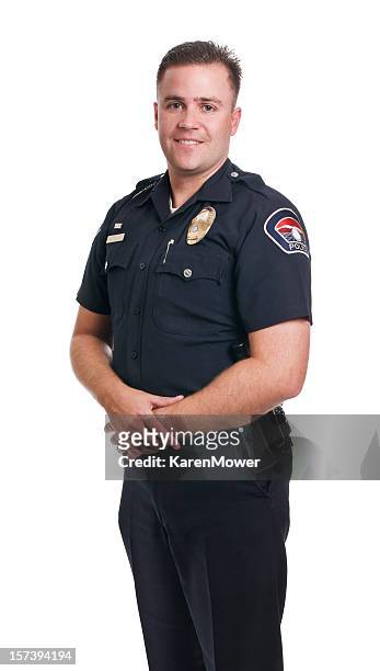 smiling police officer - police uniform stockfoto's en -beelden