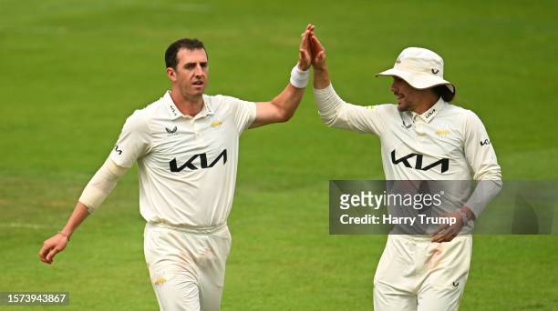 Dan Worrall of Surrey celebrates the wicket of Tom Kohler-Cadmore of Somerset with team mat Rory Burns during Day Three of the LV= Insurance County...