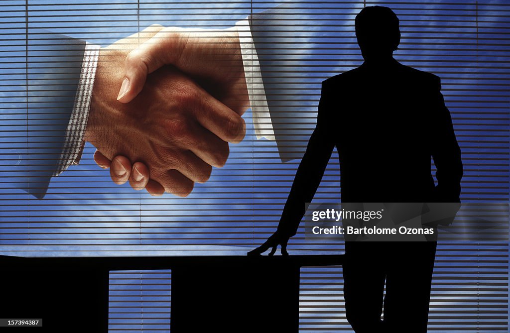 Handshake and silouette