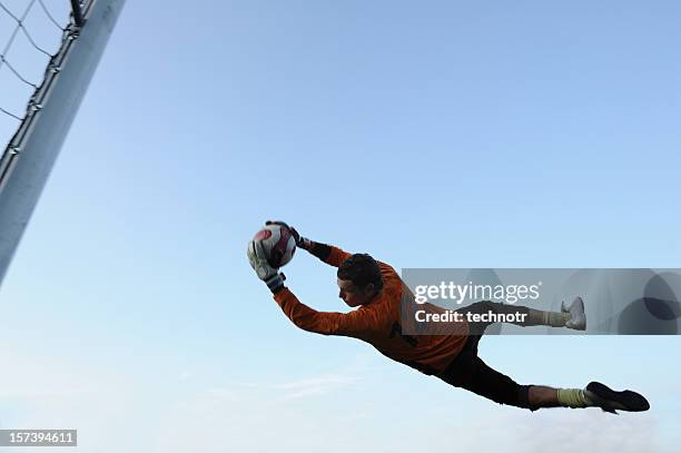 defending - goalkeeper gloves stock pictures, royalty-free photos & images