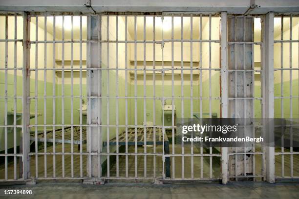prison cells with bars - prison cell door stock pictures, royalty-free photos & images