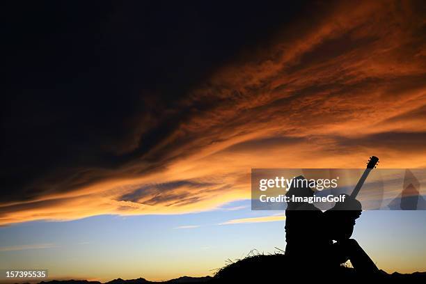 country singer songwriter silhouette - country and western music stockfoto's en -beelden