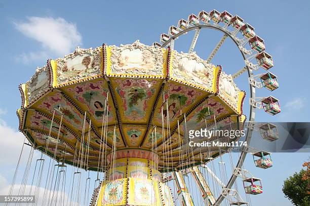 carousel in a amusement park - djurgarden stock pictures, royalty-free photos & images