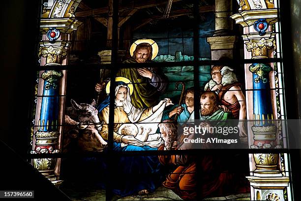 nativity scene on stained glass window - church window stock pictures, royalty-free photos & images