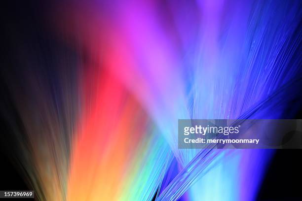multicolored lights shining in the night - the power of entertainment stock pictures, royalty-free photos & images