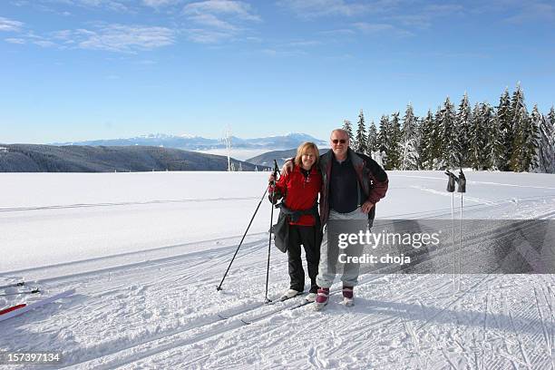 ski runners on a beautiful winter day....rogla,slovenia - cross country skiing tracks stock pictures, royalty-free photos & images