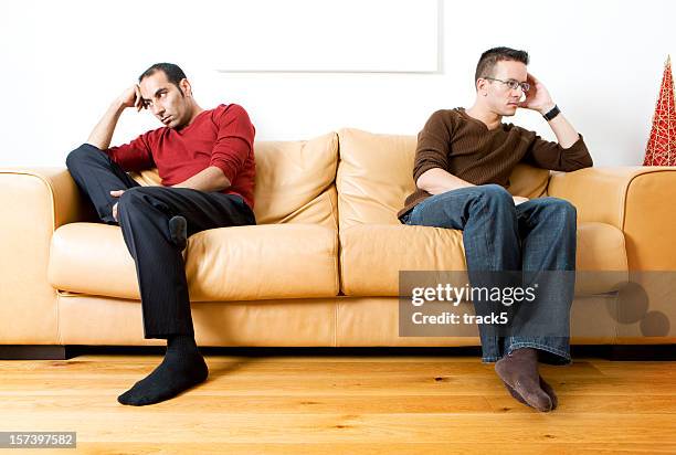 gay lifestyle: disagreement - sad gay person stock pictures, royalty-free photos & images