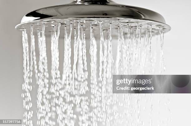 shower flow - clean water stock pictures, royalty-free photos & images