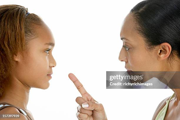 mother telling off teenage daughter - scolding stock pictures, royalty-free photos & images
