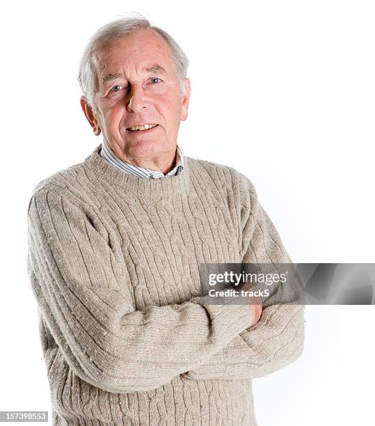 seniors: smile and eye contact from a friendly senior man - knitted stockfoto's en -beelden