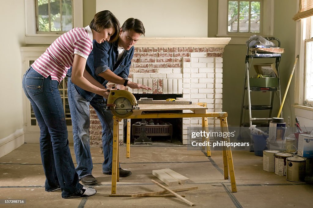 Couple renovating a home interior