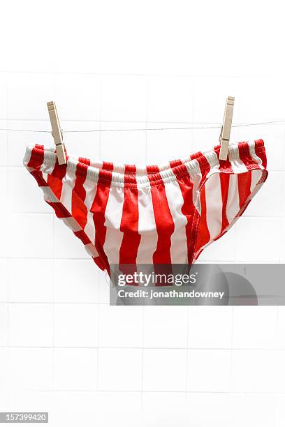 hanging to dry - zwembroek stockfoto's en -beelden